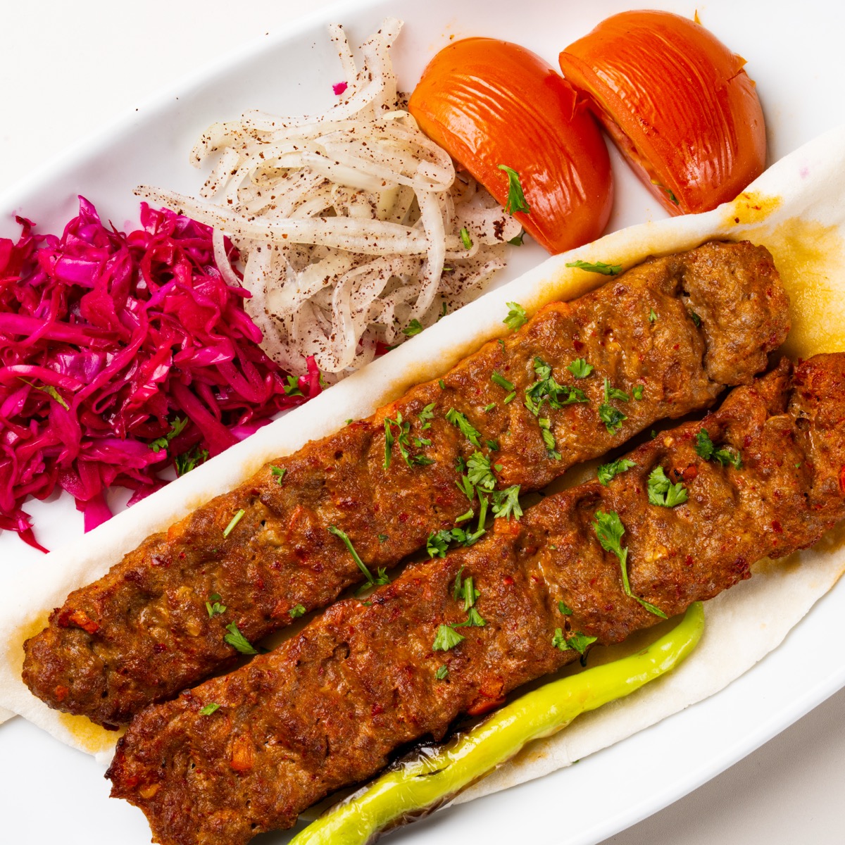 Adana kebab minced meat skewer grilled to perfection
