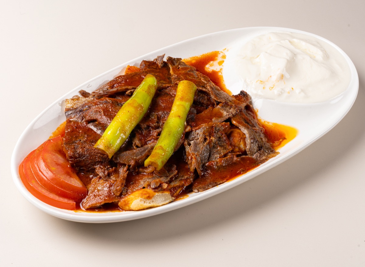 Iskender kebab, sliced beef döner with tomato sauce and yogurt