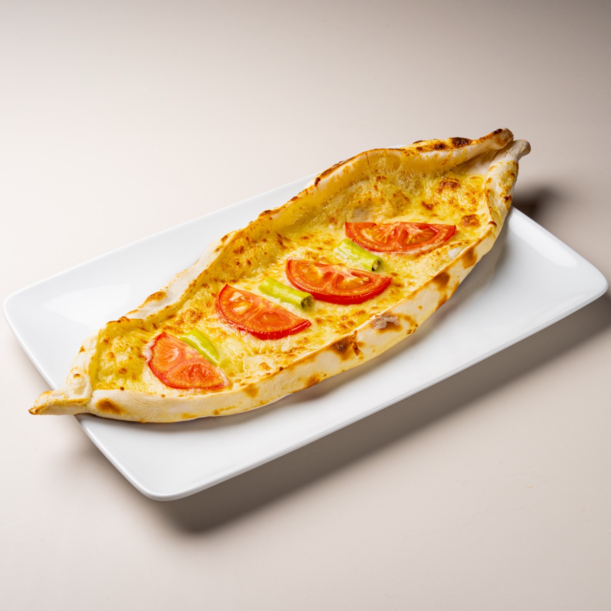 Cheese pide, boat-shaped Turkish flatbread pizza