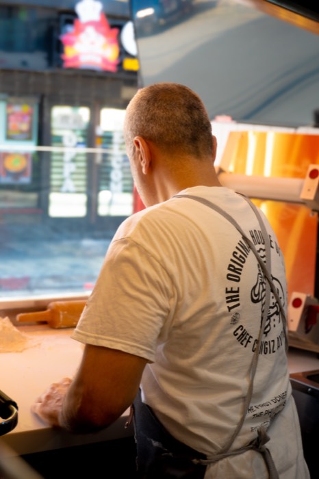 Chef preparing fresh pita dough